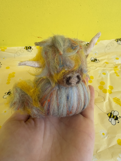 Cala the Highland Cow - Cala, a beautifully handcrafted highland cow made from wool in our shop colours. 
This was created in memory of the original owner Agnes (my mum) who sadly passed away 4 years ago.
A perfect add on to any flower gift or just as is to brighten someone's day.